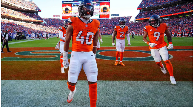 Broncos behalten Schlüsselbacker auf $ 18 Millionen Vertrag